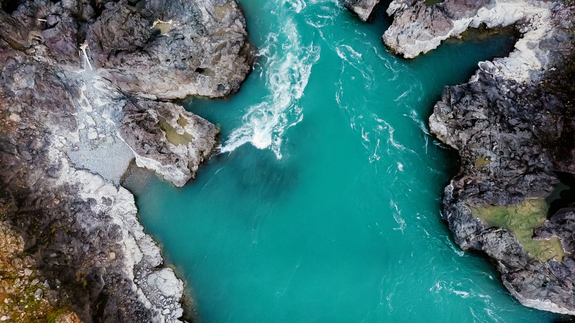 Mountain turquoise river, rocky banks aerial view. Drone shooting. Katun River, Altai.